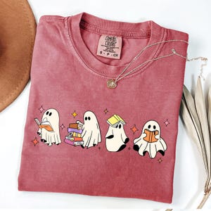 Comfort Colors® Ghost Reading Books Shirt, Bookish Halloween Shirt, Teacher Librarian Halloween Gift, Halloween Book Lover, Halloween School Cute Ghost Reading Book Halloween Tshirt, Ghost Reading Book Girly Shirt, Ghost Girly Halloween Gift, Trendy Halloween Gift
