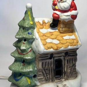 Vintage Ceramic Lighted House - Santa on Roof and Chimney Christmas Tree