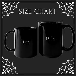 May include: Two black ceramic mugs of different sizes are displayed against a black background with a white spiderweb border. The smaller mug is labeled "11 oz." and the larger mug is labeled "15 oz." The text "SIZE CHART" is at the top.
