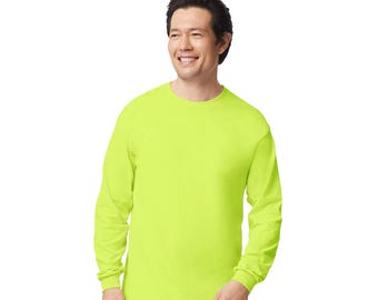 May include: A neon yellow long-sleeve shirt. The shirt has a crew neck and long sleeves. The fabric appears to be a soft, comfortable material. The shirt is a solid color with no visible graphics or patterns.