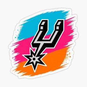 May include: A sticker featuring the San Antonio Spurs logo. The logo is a stylized silver spur and the letter "U" in black and white, set against a background of blue, pink, and orange brushstrokes.