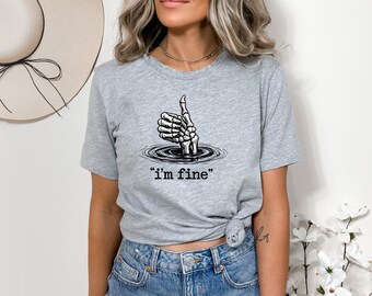 Comfort Colors® I’m Fine Funny Skeleton Hand Thumbs Up Graphic by T-Shirt Design Bundle · Creative Fabrica