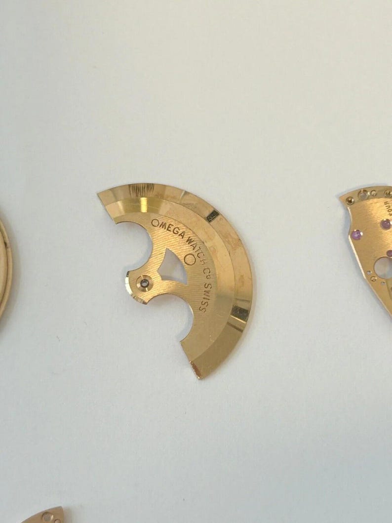 Omega 752 Watch Movement Parts Balance Fork Wheel Spring Bridge Calander Desk image 10