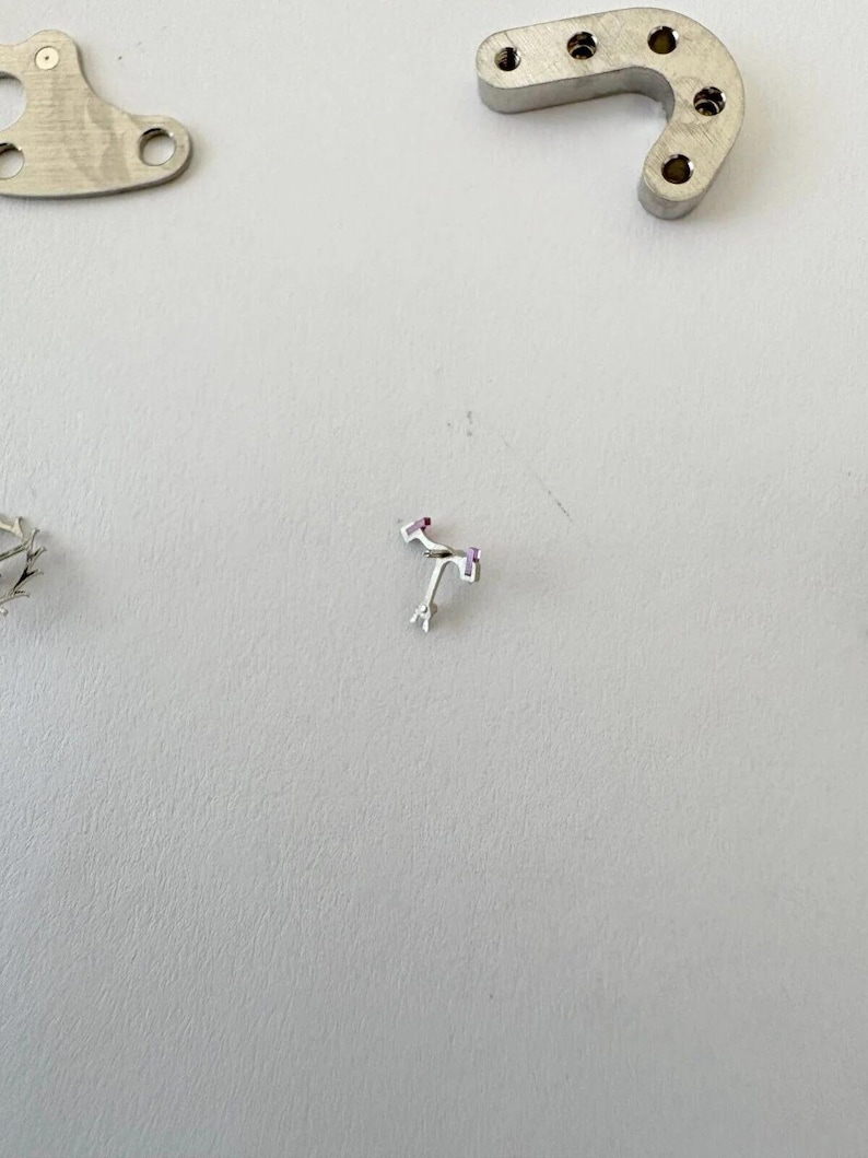 Jaeger LeCoultre Cal 229 Uhrwerkteil Unruhgabel Tonnenrad Platten Bild 8