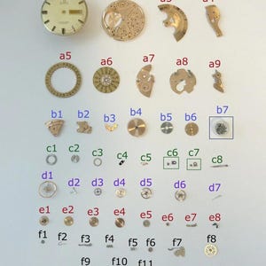 Omega 752 Watch Movement Parts Balance Fork Wheel Spring Bridge Calander Desk image 1