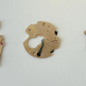Omega 752 Watch Movement Parts Balance Fork Wheel Spring Bridge Calander Desk image 14