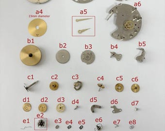 Movimiento del reloj Jaeger LeCoultre Calibre 219, pieza de equilibrio, horquilla, barrilete, rueda, esfera