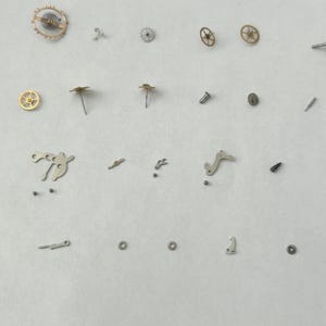 Piezas del movimiento del reloj Lemania Cal CH27 C12 1270 1275 1280 OMEGA 320 321 imagen 8