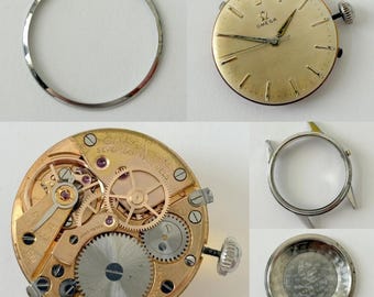 Omega Cal 285 Watch Movement Parts Balance Fork Spring Bridge Barrel 14390-6-SC