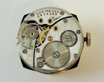 Piezas de reloj Elgin Cal 554 Movimiento Equilibrio Horquilla Ruedas Puente de resorte