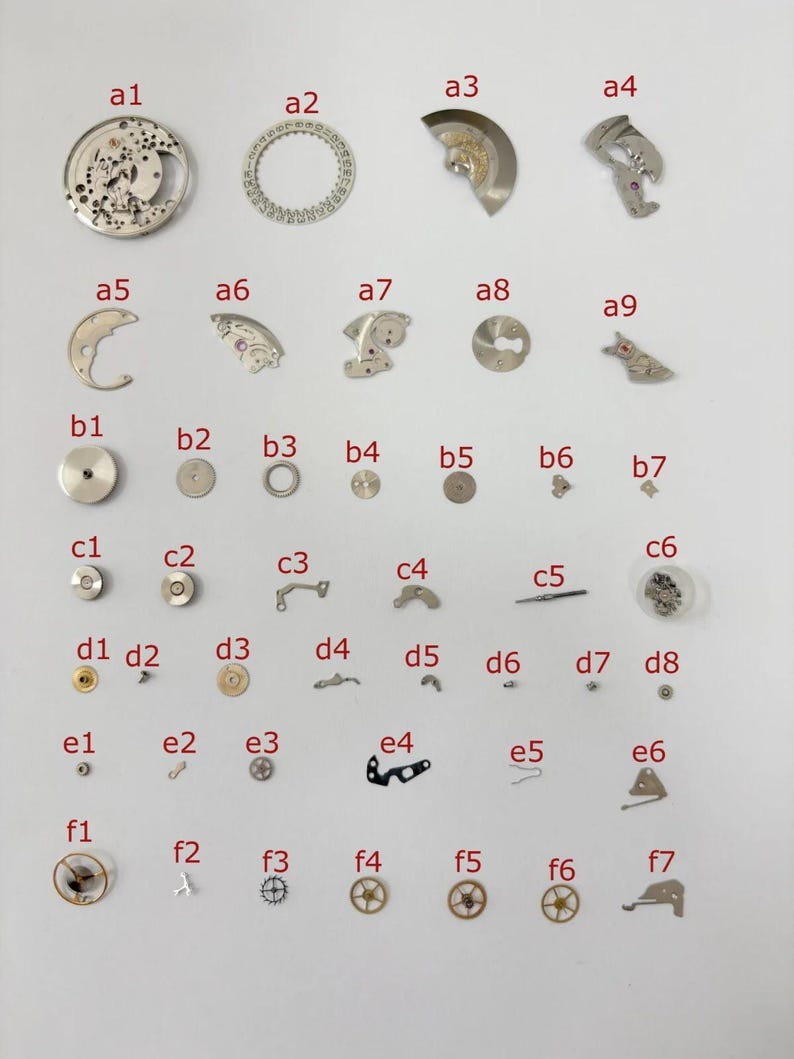 Zodiac Cal 70-72 Watch Movement Part Balance Fork Wheel Spring Bridge Disk Sea image 1