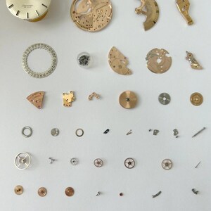 Omega Cal 562 Watch Movement Parts Balance Fork Wheel Spring Bridge 166.020 5 image 2