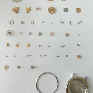Omega Cal 562 Watch Movement Parts Balance Fork Wheel Spring Bridge 166.020 5 image 3