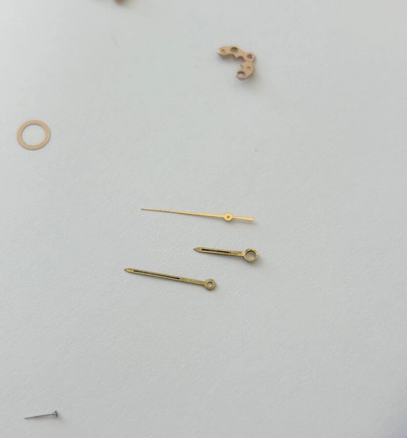 Omega Cal 550 Uhrwerk-Teile Zifferblatt Unruh Federplatte Gabelrad Rotor 6 Bild 13