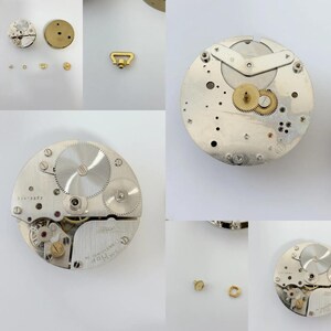 Reloj calibre 544 de IMHOF, PICK-A-PART, movimiento de 8 días, perilla de cuerda, pies de equilibrio