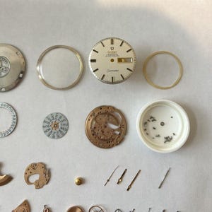 Omega Cal 751 Parts Movement Balance Fork Wheel Spring Bridge Watch Dial 166.032 image 2