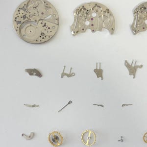 Jaeger LeCoultre Cal 814 Memovox Alarm Movement Part Balance Fork Barrel Wheel image 2
