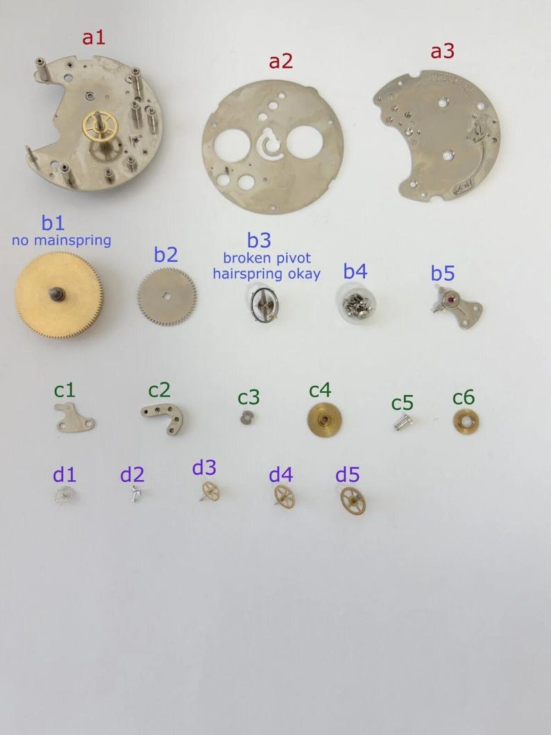 Jaeger LeCoultre Cal 229 Uhrwerkteil Unruhgabel Tonnenrad Platten Bild 1