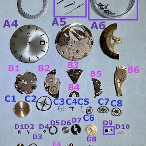 Omega Cal 565 Parts Movement Balance Fork Wheels Springs Bridge image 1