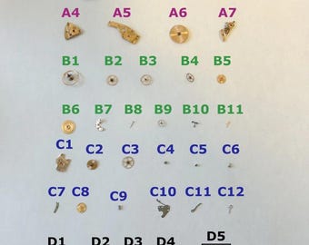 Peças do mecanismo do relógio Omega Cal 552: Garfo, roda dentada, mola, ponte, escape, balanço
