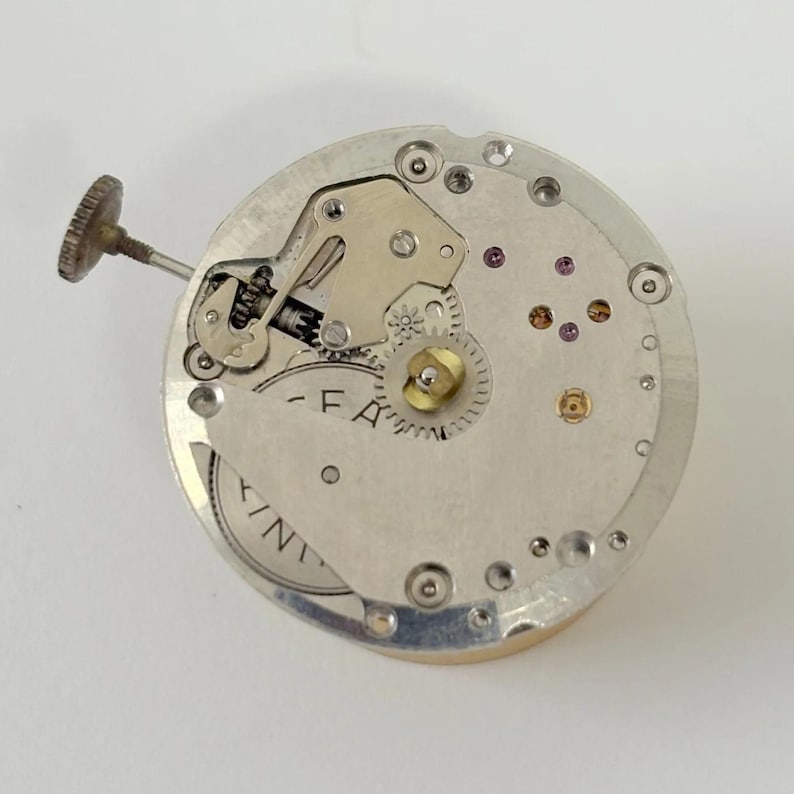 Movimento dell'orologio Longines Cal L847.4 per parti, bilanciere, forcella, molla, ponte immagine 2