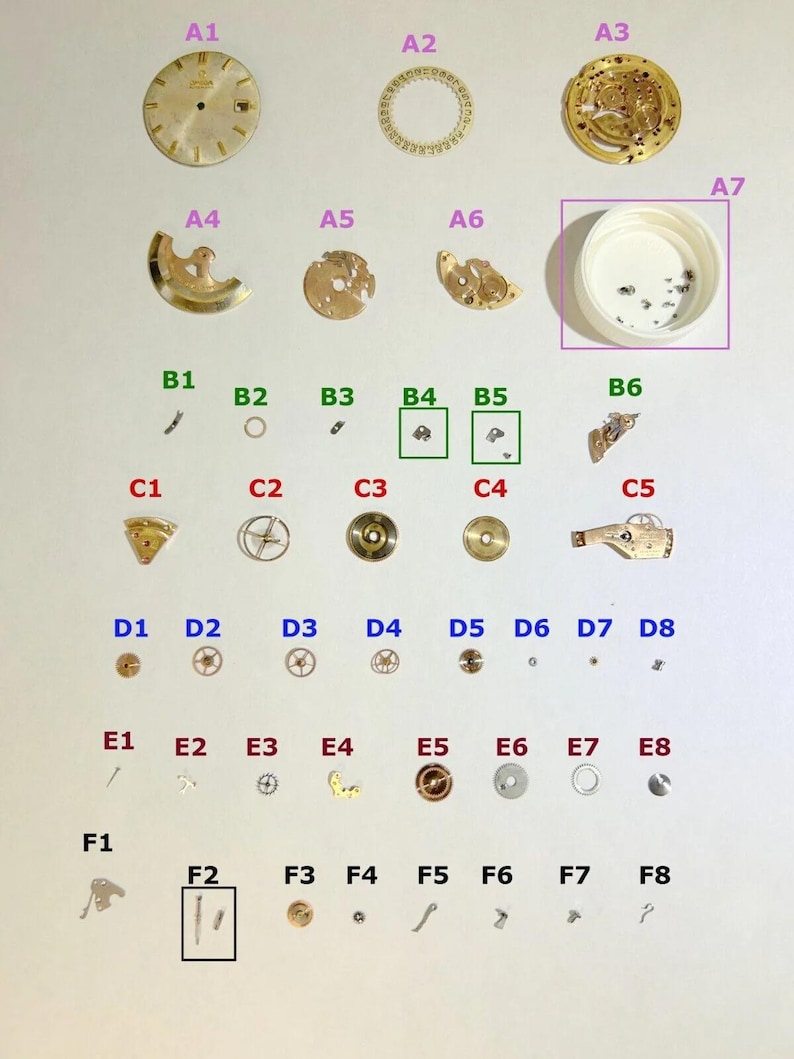 Omega Cal 560 Teile Uhrwerk Unruh Gabel Räder Federn Brücke Uhr Zifferblatt Schreibtisch Bild 1