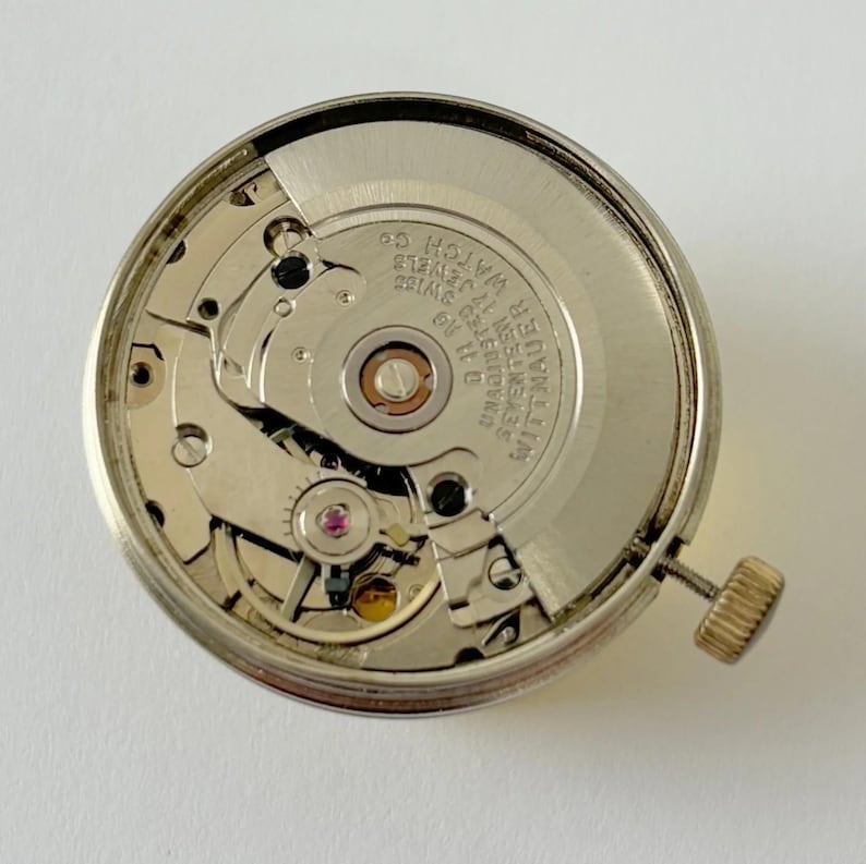 Wittnauer Caliber D11 AG Części zegarka Mechanizm Balans Widełki Sprężyna Mostek D11AG zdjęcie 2