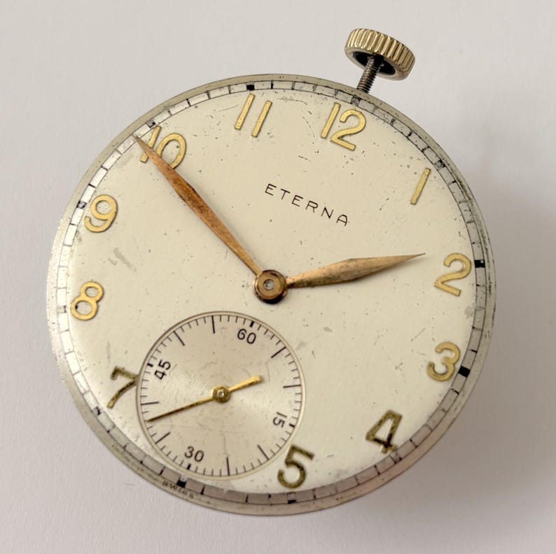 Reloj de bolsillo Eterna Calibre 957, pieza del movimiento, horquilla del volante, muelle, puente, esfera imagen 2