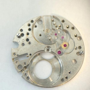 Piezas del movimiento del reloj Lemania Cal CH27 C12 1270 1275 1280 OMEGA 320 321 imagen 10