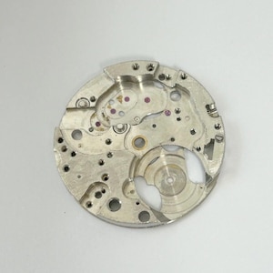 Venus Cal 170 Movement Part Balance Wheel Spring Barrel Bridge Wakmann Breitling image 12
