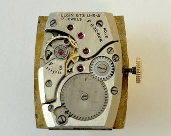 Piezas de reloj Elgin Cal 673 Movimiento Equilibrio Horquilla Ruedas Puente de resorte