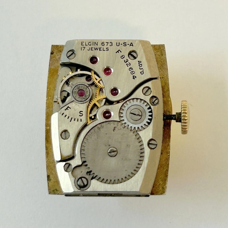 Elgin Cal 673 Uhrenteile Uhrwerk Balance Gabelräder Federbrücke Bild 1