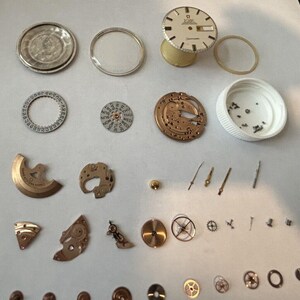 Omega Cal 751 Parts Movement Balance Fork Wheel Spring Bridge Watch Dial 166.032 image 10