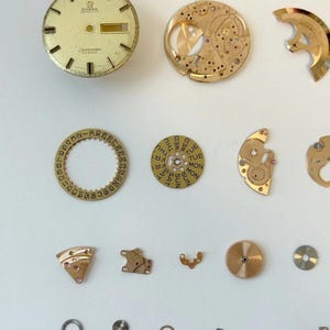 Omega 752 Watch Movement Parts Balance Fork Wheel Spring Bridge Calander Desk image 2