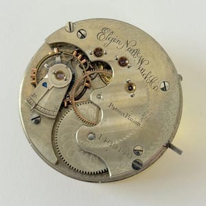 エルジン グレード67 懐中時計部品 ムーブメント テンプ フォーク スプリング ブリッジ ダイヤル 針 画像 1