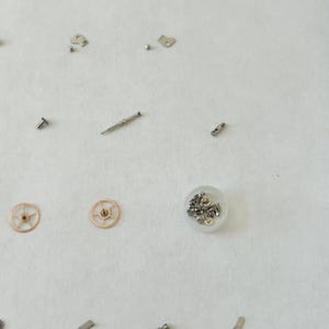 Omega Cal 563 Watch Parts Movement Calendar Disk Fork Wheels Springs Bridge 2 image 12