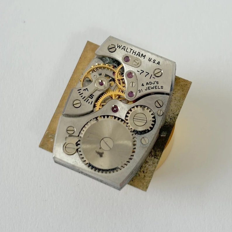 Waltham Calibre 771 Uhrenteile Uhrwerk Unruh Gabel Räder Federbrücke Bild 1
