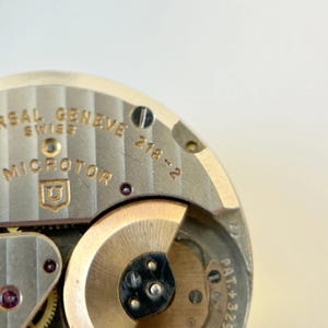 Universal Geneve Polerouter Cal 218-2 Watch Parts Movement Balance Fork Spring image 3