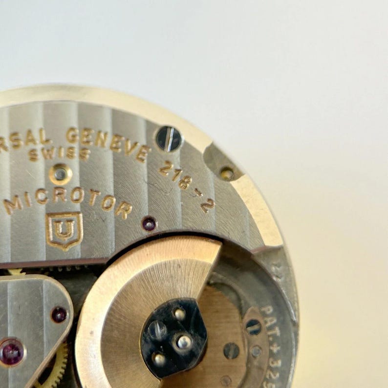 Universal Geneve Polerouter Cal 218-2 Watch Parts Movement Balance Fork Spring image 3