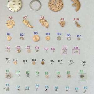 Omega Cal 563 Watch Parts Movement Calendar Disk Fork Wheels Springs Bridge 2 image 1