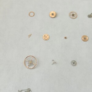 Omega Cal 563 Watch Parts Movement Calendar Disk Fork Wheels Springs Bridge 2 image 9