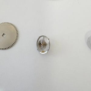 Jaeger LeCoultre Cal 229 Uhrwerkteil Unruhgabel Tonnenrad Platten Bild 6