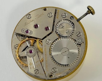 Movimento, bilanciere, ruote, ponte, quadrante, parti dell'orologio Mathey Tissot Cal 80