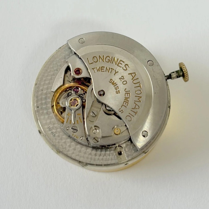 Movimento automatico Longines Calibro 19 AS, parti dell'orologio, bilanciere, molla 19AS immagine 1