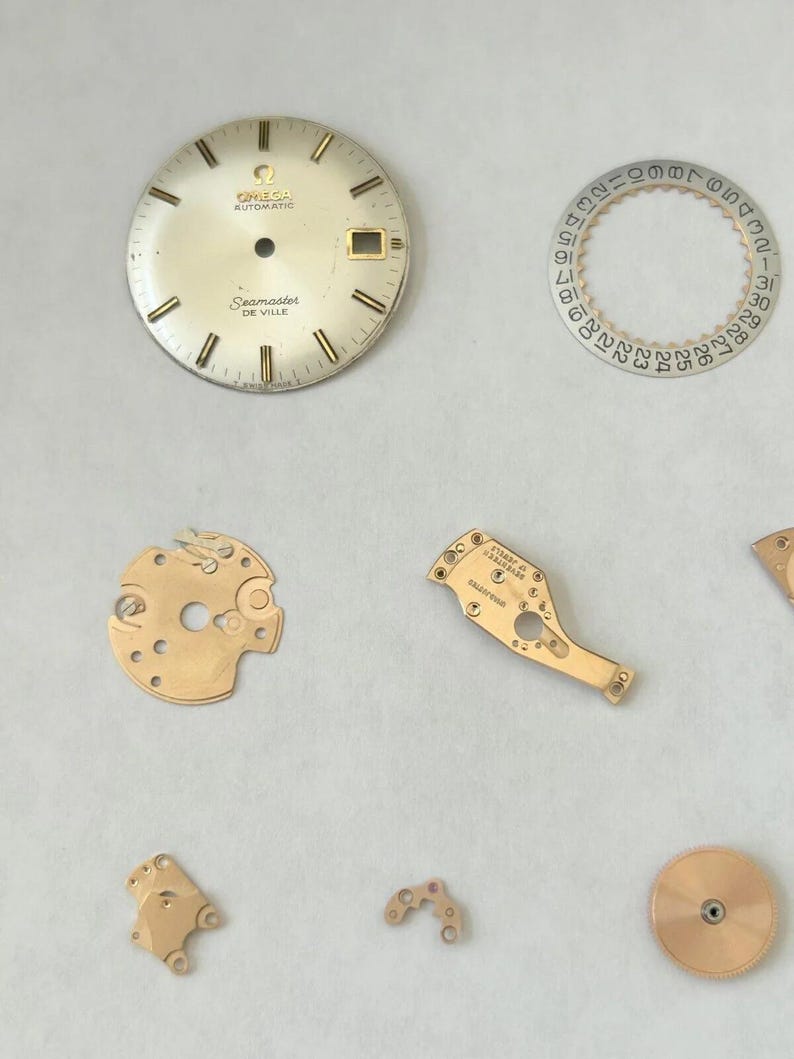 Omega Cal 563 Watch Parts Movement Calendar Disk Fork Wheels Springs Bridge 2 image 2
