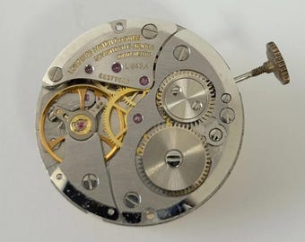 Movimento dell'orologio Longines Cal L847.4 per parti, bilanciere, forcella, molla, ponte