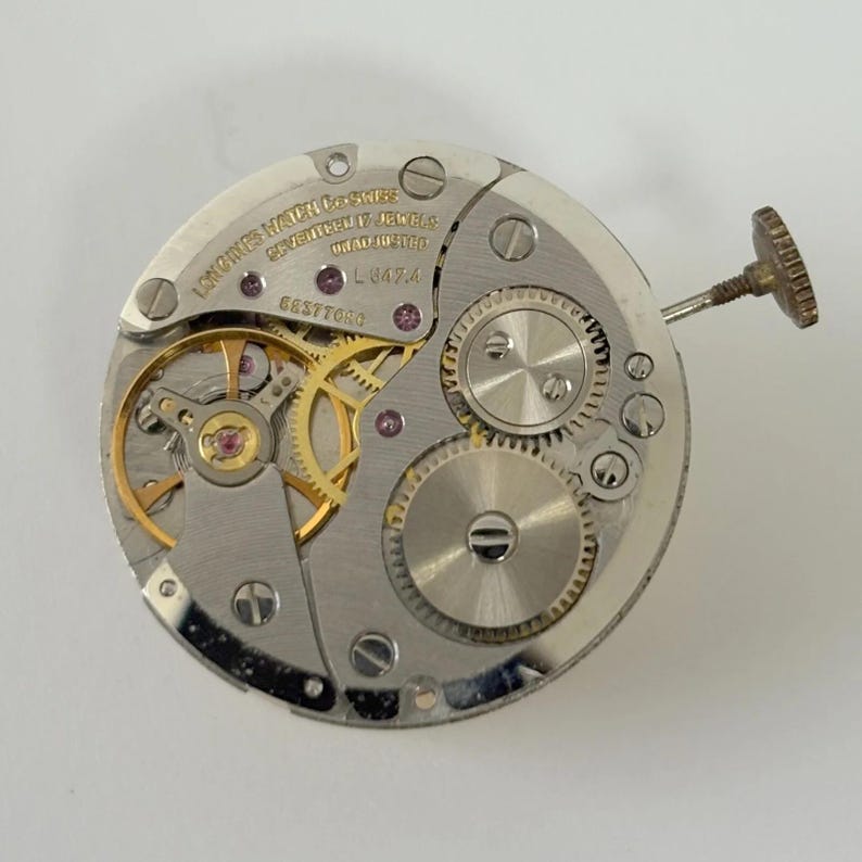 Movimento dell'orologio Longines Cal L847.4 per parti, bilanciere, forcella, molla, ponte immagine 1