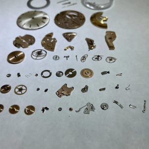 Omega Cal 565 Parts Movement Balance Fork Wheels Springs Bridge image 2