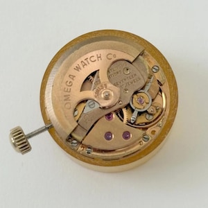 Omega Cal 670 uurwerkonderdelen Balansvork Veerbrug Loopwielen