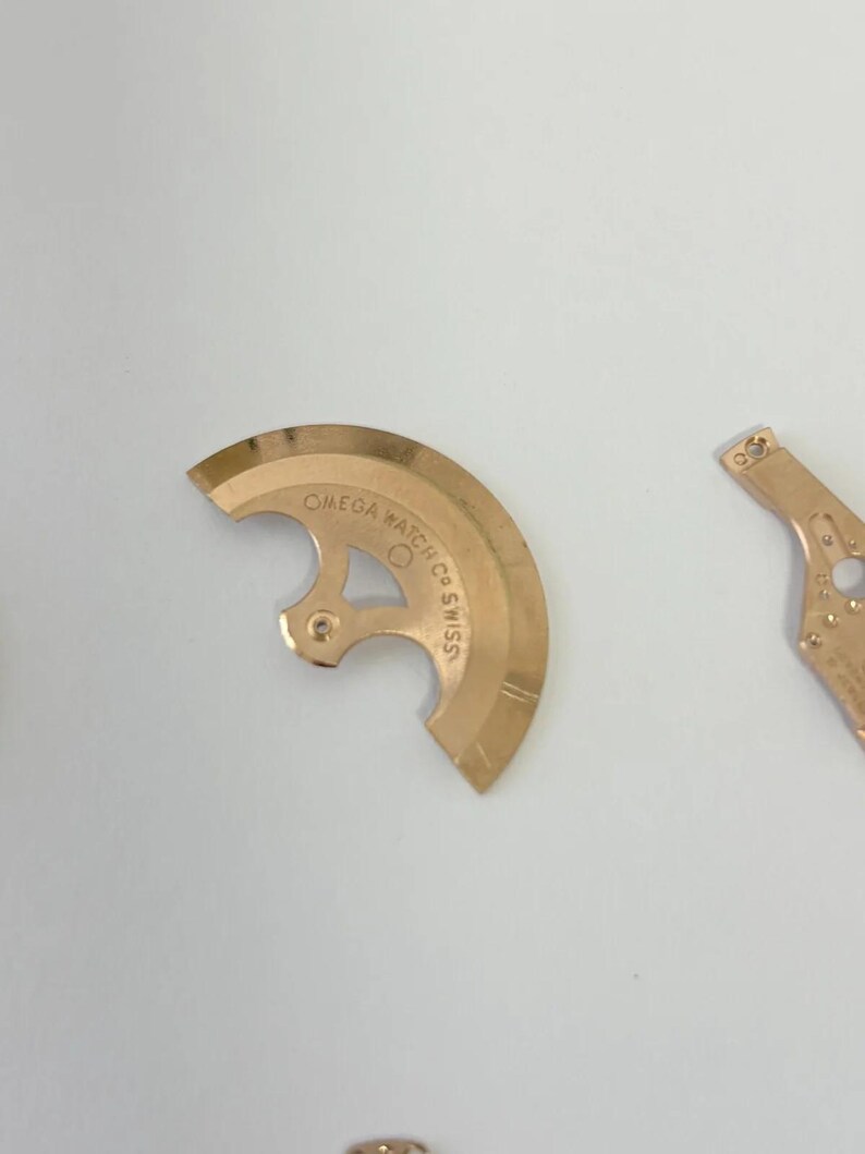 Omega Cal 550 Uhrwerk-Teile Zifferblatt Unruh Federplatte Gabelrad Rotor 6 Bild 10